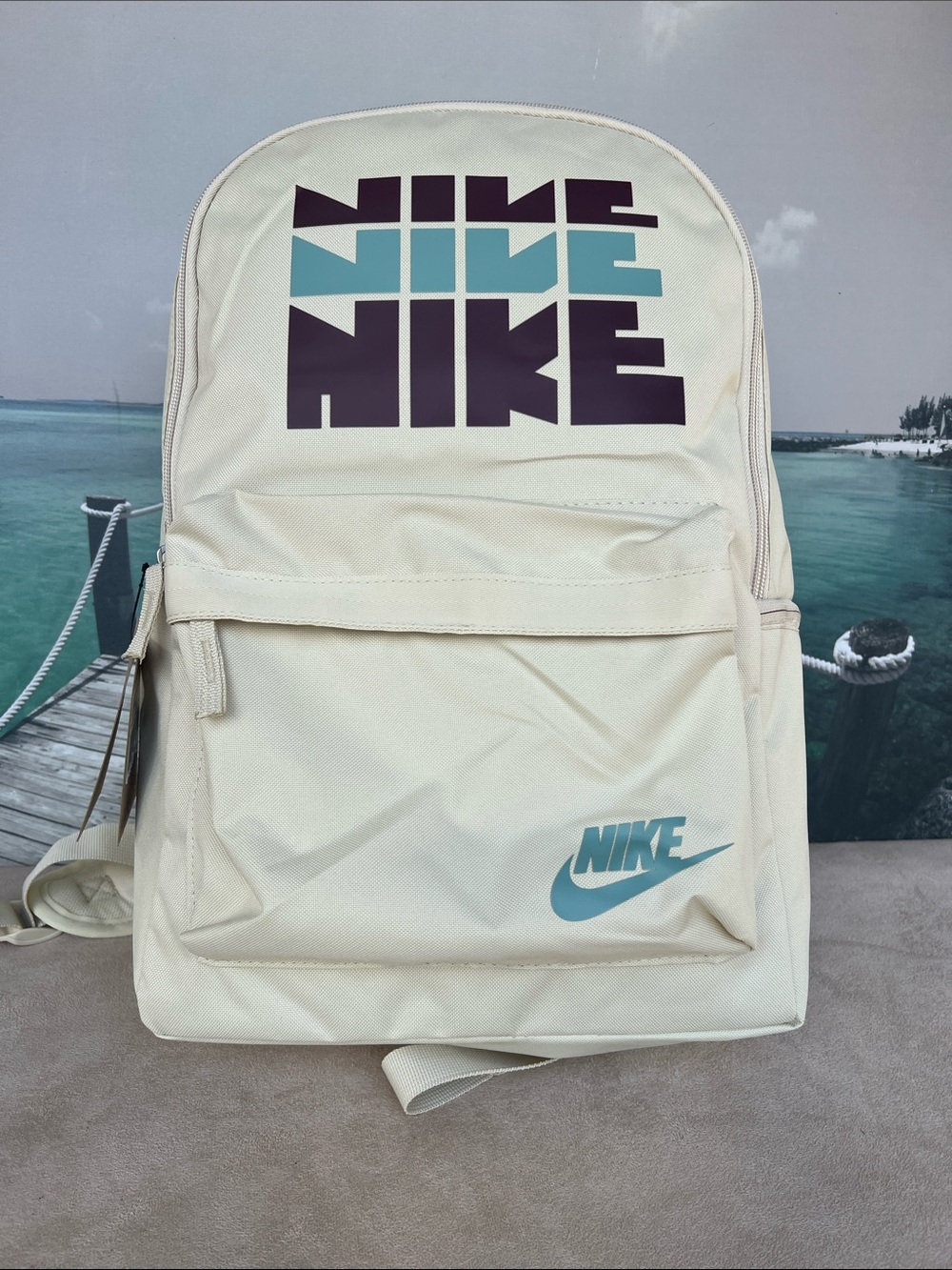 Nike Cream Backpack with Teal and Dark Purple Logo